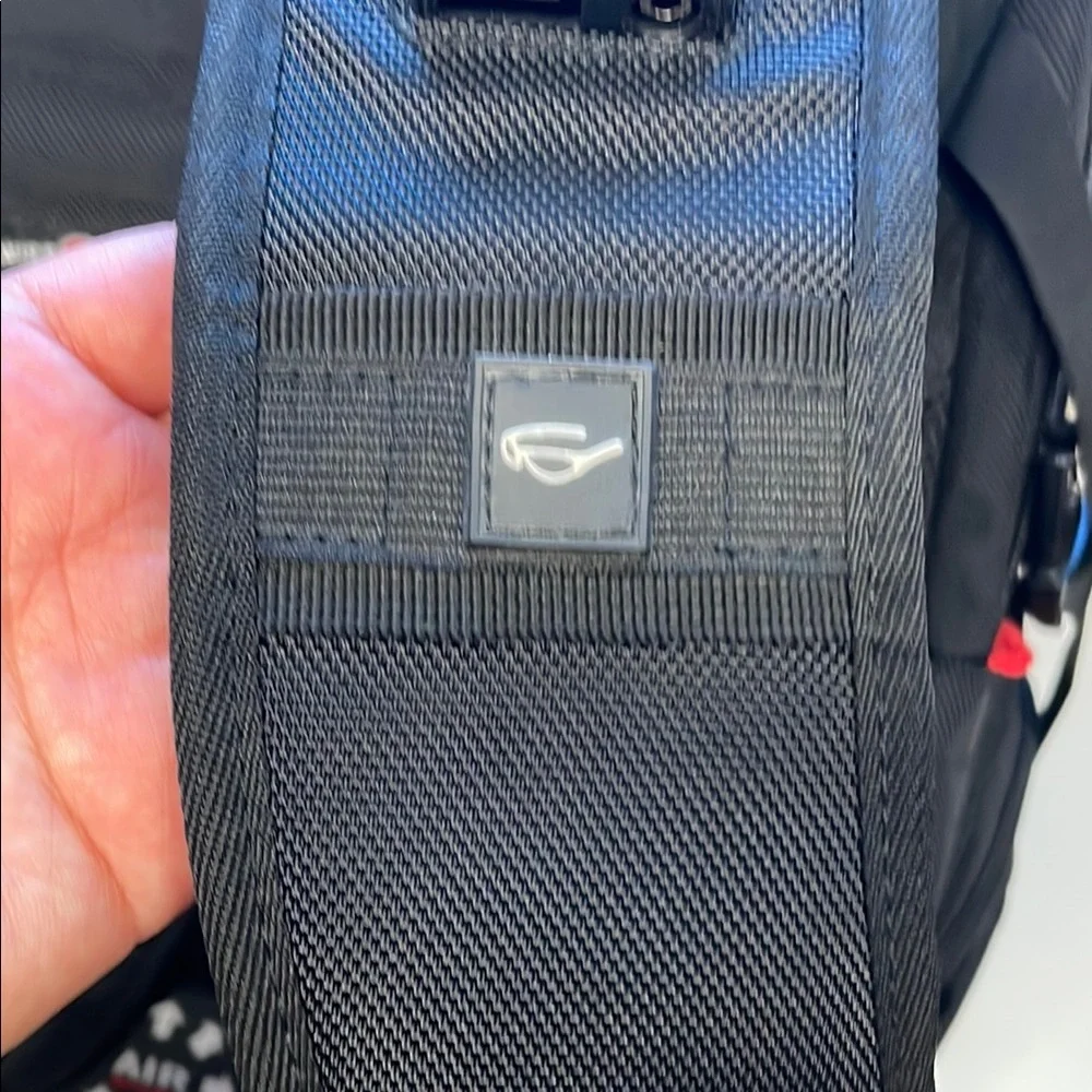 SwissGear Black Backpack with Padded Straps and Multiple Compartments